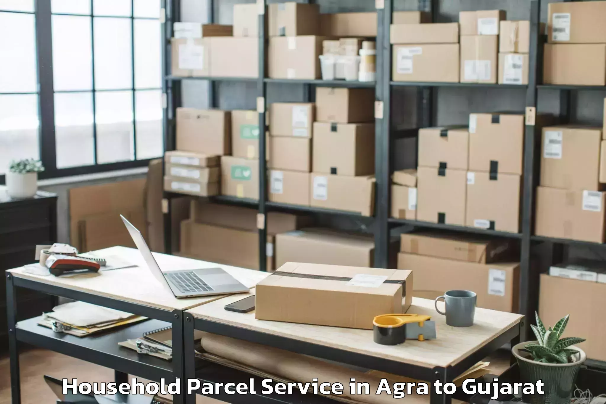 Top Agra to Crystal Mall Rajkot Household Parcel Available